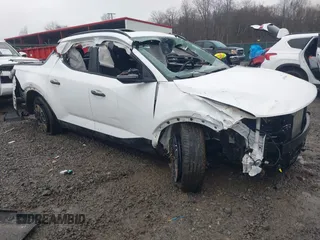 2022 Hyundai Santa Cruz SEL z VIN 5NTJCDAE4NH029574, wystawiony jako IAAI lot #41855440 z przebiegiem 69 388 mil mil oraz . Historia ofert i sprzedaży dostępna na DreamBid. Obrazek 1.