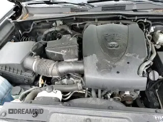 2019 Toyota Tacoma SR5 с VIN 5TFSZ5AN4KX206292, выставлен на аукционе Copart как лот 69773655 с пробегом 116 560 миль миль и Списание • Salvage title. История ставок и продаж доступна на DreamBid. Изображение 14.