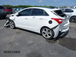 2013 Hyundai Elantra GT with VIN KMHD35LE0DU048766, listed as a IAAI auction lot 41644934 with 158,965 mi miles. Bid and sale history available at carsss.com. Image 3.