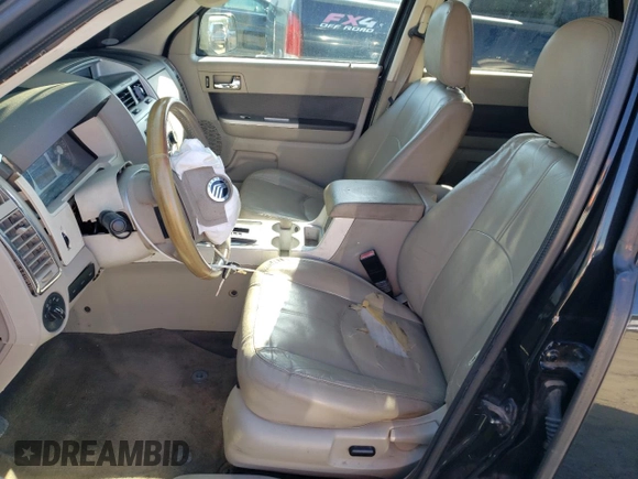2011 Mercury Mariner Premier with VIN 4M2CN8HG3BKJ00612, listed as a Copart auction lot 53490645 with 154,119 mi miles and Salvage title. Bid and sale history available at DreamBid. Image 7.