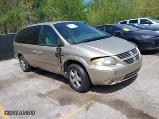 2005 Dodge Caravan SXT with VIN 2D4GP44L35R354679, listed as a IAAI auction lot 42086549 with 225,428 mi miles. Bid and sale history available at carsss.com. Image 1.