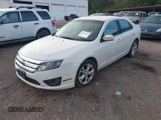 2012 Ford Fusion SE z VIN 3FAHP0HG3CR445925, wystawiony jako IAAI lot #42664342 z przebiegiem 194 798 mil mil oraz . Historia ofert i sprzedaży dostępna na DreamBid. Obrazek 2.