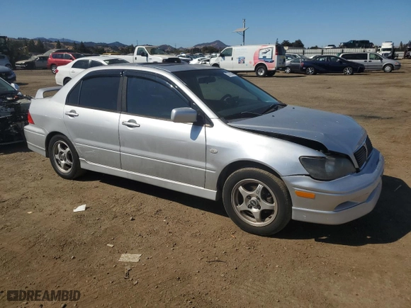 2003 Mitsubishi Lancer OZ-Rally with VIN JA3AJ86E43U048700, listed as a Copart auction lot 73719154 with 178,121 mi miles and Salvage Title. Bid and sale history available at carsss.com. Image 4.