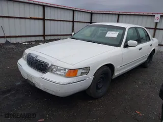 2002 Mercury Grand Marquis GS with VIN 2MEFM74WX2X601019, listed as a IAAI auction lot 41766017 with 271,421 mi miles. Bid and sale history available at carsss.com. Image 2.