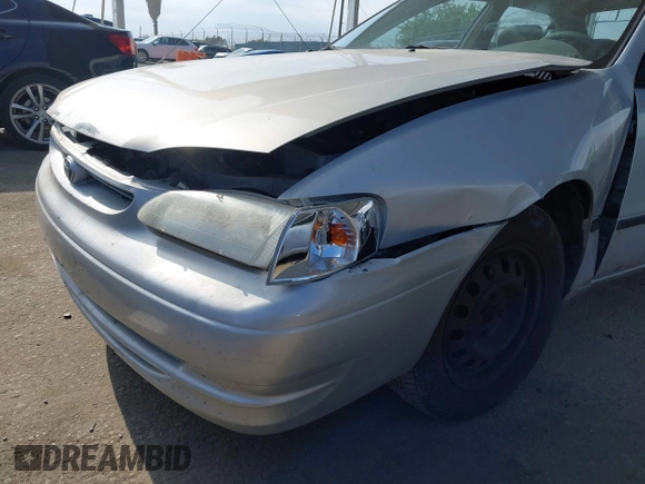 2000 Toyota Corolla VE with VIN 1NXBR12E6YZ393077, listed as a IAAI auction lot 42111914 with 181,056 mi miles and . Bid and sale history available at DreamBid. Image 6.