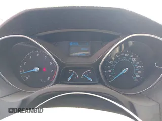 2012 Ford Focus SE z VIN 1FAHP3K28CL343856, wystawiony jako IAAI lot #41990103 z przebiegiem 176 588 mil mil oraz . Historia ofert i sprzedaży dostępna na DreamBid. Obrazek 7.