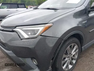 2017 Toyota RAV4 Hybrid Limited with VIN JTMDJREV8HD144858, listed as a IAAI auction lot 42092847 with 135,046 mi miles. Bid and sale history available at carsss.com. Image 6.