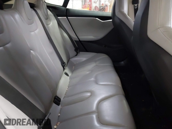 2014 Tesla Model S 60 with VIN 5YJSA1H16EFP52853, listed as a IAAI auction lot 41941989 with 132,038 mi miles and . Bid and sale history available at DreamBid. Image 8.