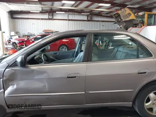 2000 Honda Accord EX z VIN 1HGCG1657YA053433, wystawiony jako IAAI lot #42322643 z przebiegiem 146 517 mil mil oraz . Historia ofert i sprzedaży dostępna na DreamBid. Obrazek 14.