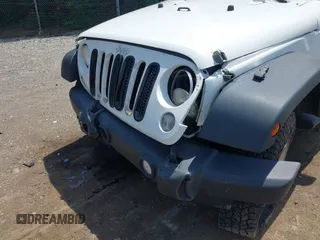 2014 Jeep Wrangler Unlimited Sport z VIN 1C4BJWDG6EL115627, wystawiony jako IAAI lot #42245390 z przebiegiem 121 944 mil mil oraz . Historia ofert i sprzedaży dostępna na DreamBid. Obrazek 6.