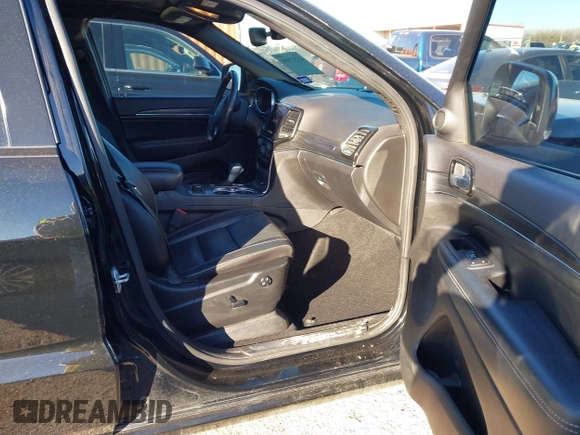 2021 Jeep Grand Cherokee 80th Anniversary with VIN 1C4RJFBG9MC527654, listed as a IAAI auction lot 41212055 with 92,436 mi miles and . Bid and sale history available at DreamBid. Image 5.