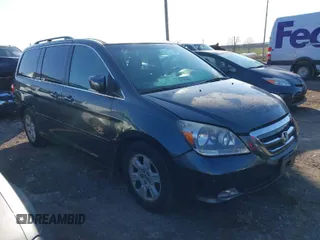 2006 Honda Odyssey TOURING with VIN 5FNRL38806B112009, listed as a IAAI auction lot 42002337 with 148,140 mi miles. Bid and sale history available at carsss.com. Image 1.