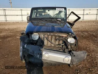 2010 Jeep Wrangler Sahara with VIN 1J4AA5D13AL139504, listed as a Copart auction lot 52746725 with Not provided miles and Salvage title. Bid and sale history available at DreamBid. Image 5.