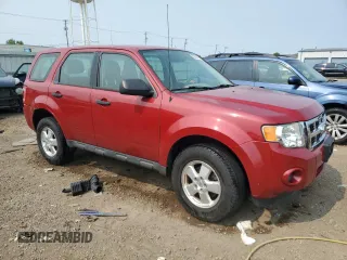 2011 Ford Escape XLS with VIN 1FMCU0C75BKA53581, listed as a Copart auction lot 59046365 with 135,134 mi miles and Salvage title. Bid and sale history available at DreamBid. Image 4.