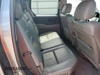 2014 Honda Ridgeline RTL z VIN 5FPYK1F53EB004694, wystawiony jako Copart lot #57222085 z przebiegiem 128 210 mil mil oraz Szkoda całkowita • Salvage title. Historia ofert i sprzedaży dostępna na DreamBid. Obrazek 10.