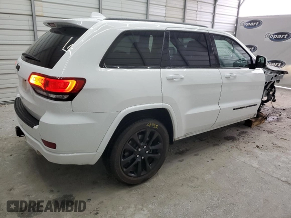 2022 Jeep Grand Cherokee WK Laredo X with VIN 1C4RJEAG1NC128279, listed as a Copart auction lot 70806244 with 104,478 mi miles and Salvage Title. Bid and sale history available at carsss.com. Image 3.