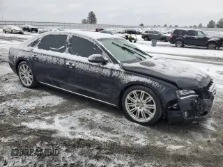 2014 Audi A8 L 3.0T with VIN WAURGAFD1EN002981, listed as a Copart auction lot 87282884 with 106,763 mi miles and Salvage Title. Bid and sale history available at carsss.com. Image 4.