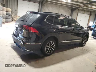 2021 Volkswagen Tiguan SE with VIN 3VV2B7AXXMM071024, listed as a Copart auction lot 52243675 with 31,448 mi miles and Salvage Title. Bid and sale history available at DreamBid. Image 3.