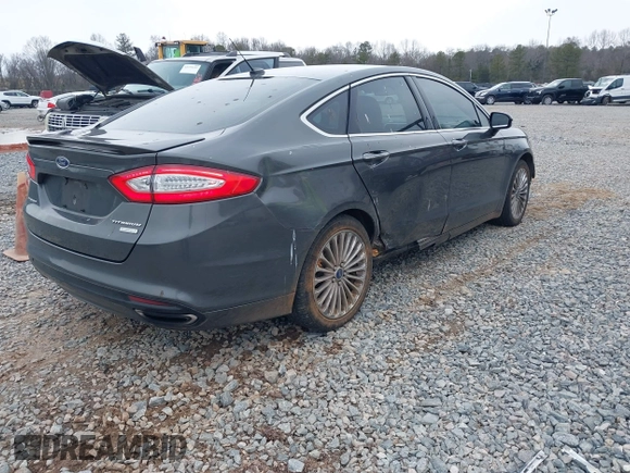 2016 Ford Fusion Titanium with VIN 3FA6P0K94GR183257, listed as a IAAI auction lot 41374728 with 67,780 mi miles and . Bid and sale history available at carsss.com. Image 4.