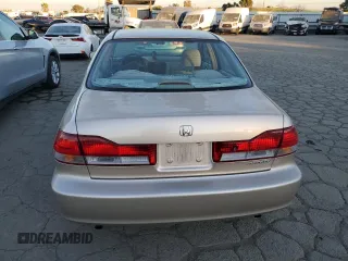 2001 Honda Accord LX z VIN 1HGCG16461A067174, wystawiony jako Copart lot #87543245 z przebiegiem 148 410 mil mil oraz Czysty tytuł • Clean title. Historia ofert i sprzedaży dostępna na DreamBid. Obrazek 6.