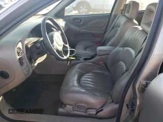 2002 Pontiac Bonneville SLE z VIN 1G2HY54K424205499, wystawiony jako Copart lot #76815334 z przebiegiem 84 715 mil mil oraz Szkoda całkowita • Salvage title. Historia ofert i sprzedaży dostępna na DreamBid. Obrazek 7.