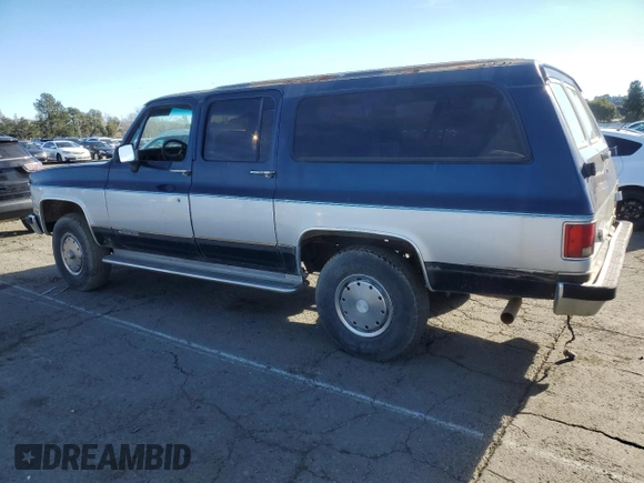 1991 Chevrolet Suburban z VIN 1GNGV26K1MF104219, wystawiony jako Copart lot #87527045 z przebiegiem 189 345 mil mil oraz Czysty tytuł • Clean title. Historia ofert i sprzedaży dostępna na DreamBid. Obrazek 2.