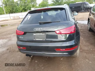 2015 Audi Q3 Premium Plus z VIN WA1EFCFS6FR001473, wystawiony jako IAAI lot #42795951 z przebiegiem 148 638 mil mil oraz . Historia ofert i sprzedaży dostępna na DreamBid. Obrazek 16.