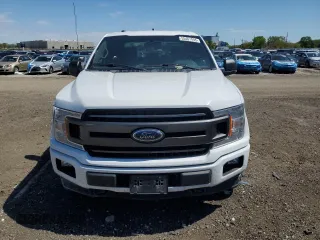 2018 Ford F-150 XL with VIN 1FTFW1E5XJFA09466, listed as a Copart auction lot 55461845 with 123,366 mi miles and Salvage title. Bid and sale history available at DreamBid. Image 5.