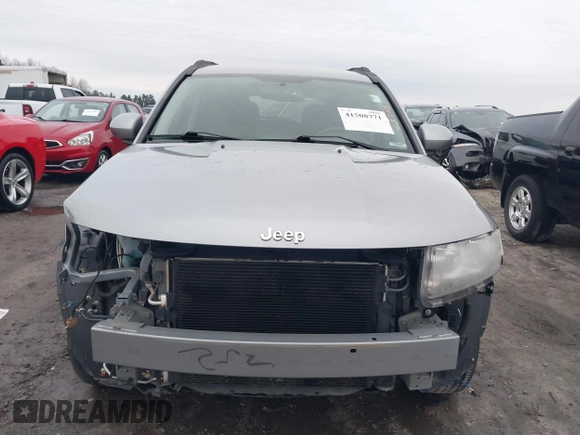 2016 Jeep Compass Latitude with VIN 1C4NJCEA2GD719694, listed as a IAAI auction lot 41508771 with 121,469 mi miles. Bid and sale history available at carsss.com. Image 13.