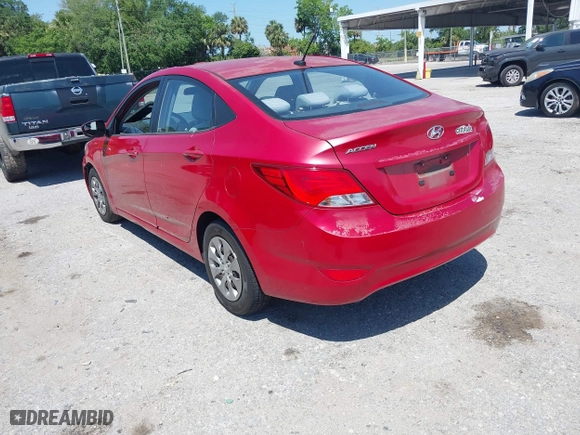 2015 Hyundai Accent GLS with VIN KMHCT4AE1FU801913, listed as a IAAI auction lot 42035825 with 104,701 mi miles. Bid and sale history available at carsss.com. Image 3.