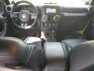 2013 Jeep Wrangler Unlimited Rubicon 10th Anniversary with VIN 1C4HJWFG4DL549065, listed as a Copart auction lot 75899594 with 127,960 mi miles and Salvage title. Bid and sale history available at DreamBid. Image 8.