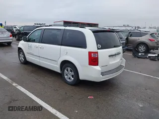 2010 Dodge Grand Caravan SXT with VIN 2D4RN5D1XAR191011, listed as a IAAI auction lot 41162015 with 83,251 mi miles and . Bid and sale history available at DreamBid. Image 3.