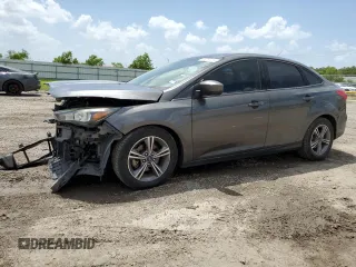 2018 Ford Focus SE z VIN 1FADP3FE1JL249236, wystawiony jako Copart lot #65263024 z przebiegiem 82 526 mil mil oraz Czysty tytuł • Clean title. Historia ofert i sprzedaży dostępna na DreamBid. Obrazek 1.