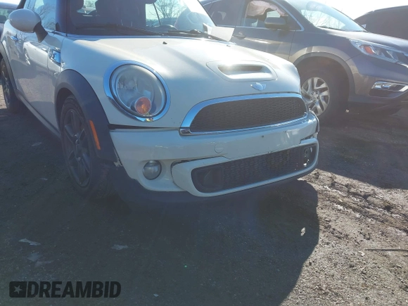 2011 MINI Convertible S with VIN WMWZP3C54BTX82748, listed as a IAAI auction lot 41817396 with 113,458 mi miles and . Bid and sale history available at DreamBid. Image 12.