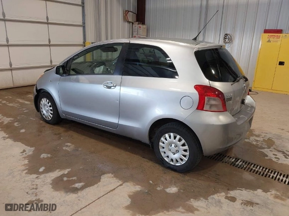 2007 Toyota Yaris with VIN JTDJT923575126617, listed as a IAAI auction lot 41824214 with 86,186 mi miles. Bid and sale history available at carsss.com. Image 3.