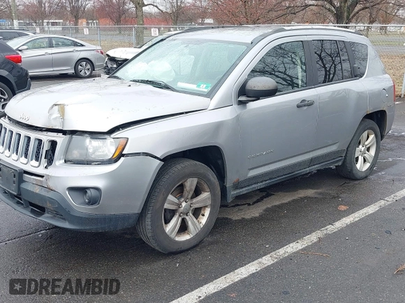 2014 Jeep Compass Sport with VIN 1C4NJDBB8ED734667, listed as a IAAI auction lot 41836914 with 221,028 mi miles. Bid and sale history available at carsss.com. Image 2.