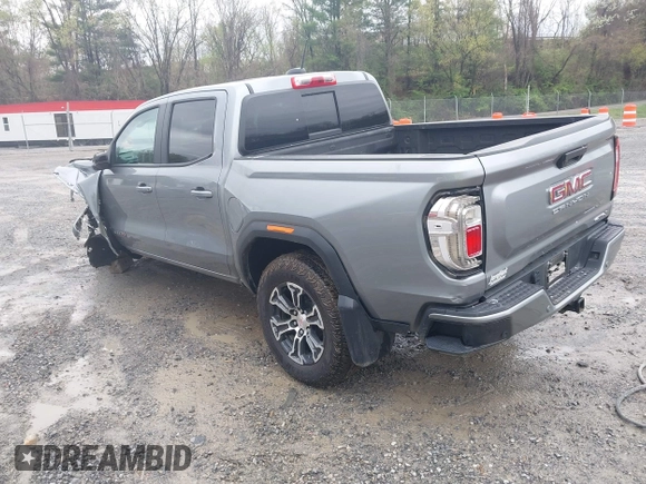 2024 GMC Canyon 4WD AT4 with VIN 1GTP6DEKXR1143138, listed as a IAAI auction lot 41952154 with 26,062 mi miles. Bid and sale history available at carsss.com. Image 3.