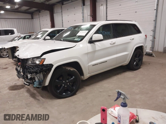 2015 Jeep Grand Cherokee Laredo with VIN 1C4RJFAG6FC606431, listed as a IAAI auction lot 41754182 with 99,987 mi miles. Bid and sale history available at carsss.com. Image 2.