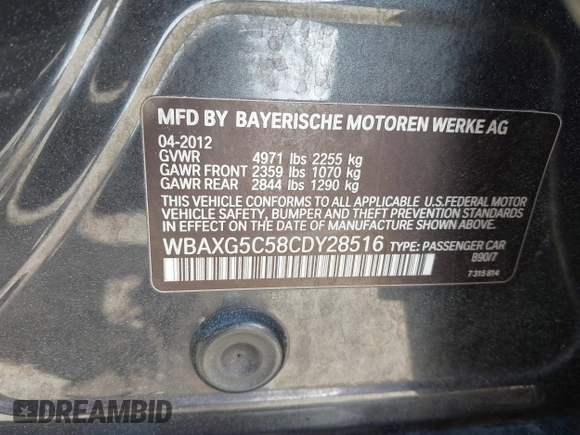 2012 BMW 5 Series 528i with VIN WBAXG5C58CDY28516, listed as a IAAI auction lot 41907803 with 116,499 mi miles. Bid and sale history available at carsss.com. Image 9.