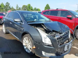 2016 Cadillac XTS Luxury Collection with VIN 2G61M5S30G9154062, listed as a IAAI auction lot 42396392 with 161,171 mi miles and . Bid and sale history available at DreamBid. Image 1.