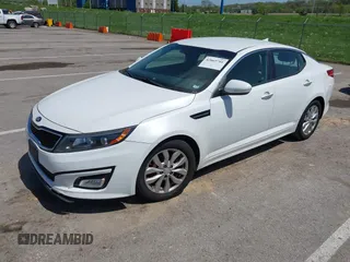 2015 Kia Optima LX with VIN 5XXGM4A76FG443962, listed as a IAAI auction lot 42069701 with 101,516 mi miles. Bid and sale history available at carsss.com. Image 2.