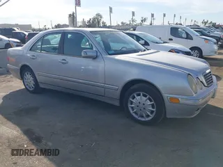 2002 Mercedes-Benz E-Class with VIN WDBJF65J72B485024, listed as a IAAI auction lot 41433088 with 100,100 mi miles. Bid and sale history available at carsss.com. Image 1.