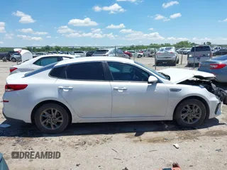2019 Kia Optima LX z VIN 5XXGT4L38KG372576, wystawiony jako IAAI lot #42248090 z przebiegiem 98 368 mil mil oraz . Historia ofert i sprzedaży dostępna na DreamBid. Obrazek 13.