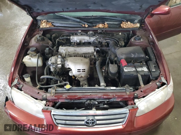 2000 Toyota Camry CE z VIN 4T1BG22K2YU938855, wystawiony jako Copart lot #56047305 z przebiegiem 129 096 mil mil oraz Szkoda całkowita • Salvage title. Historia ofert i sprzedaży dostępna na DreamBid. Obrazek 11.