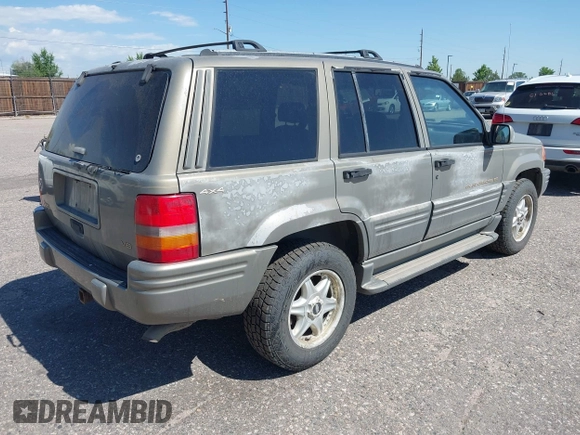 1996 Jeep Grand Cherokee Limited with VIN 1J4GZ78Y1TC162546, listed as a IAAI auction lot 42612646 with 204,098 mi miles and . Bid and sale history available at DreamBid. Image 4.