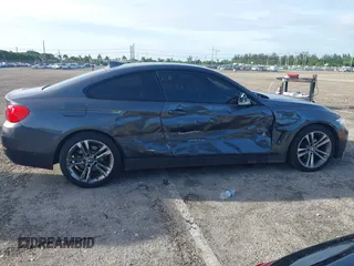 2014 BMW 4 Series 428i xDrive with VIN WBA3N5C57EK196790, listed as a IAAI auction lot 40571670 with 108,114 mi miles and . Bid and sale history available at DreamBid. Image 13.