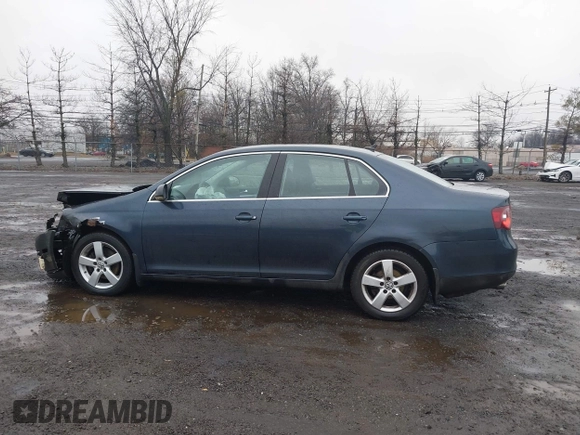 2009 Volkswagen Jetta SE z VIN 3VWRZ71K49M016683, wystawiony jako IAAI lot #41530644 z przebiegiem 106 148 mil mil oraz . Historia ofert i sprzedaży dostępna na DreamBid. Obrazek 14.
