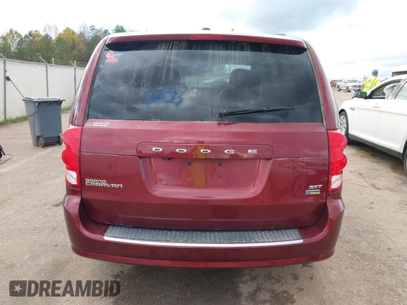 2019 Dodge Grand Caravan SXT with VIN 2C4RDGCGXKR585563, listed as a IAAI auction lot 40949350 with 122,577 mi miles and . Bid and sale history available at DreamBid. Image 17.
