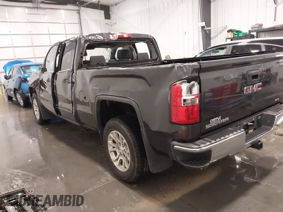 2015 GMC Sierra 1500 SLE with VIN 1GTV2UEC0FZ151760, listed as a IAAI auction lot 41988450 with 124,674 mi miles. Bid and sale history available at carsss.com. Image 3.