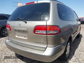 2002 Toyota Sienna LE with VIN 4T3ZF13CX2U500604, listed as a IAAI auction lot 41959768 with 139,668 mi miles. Bid and sale history available at carsss.com. Image 4.
